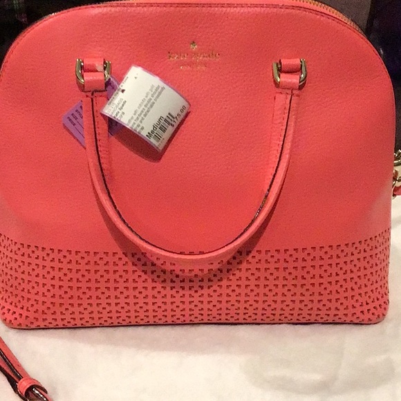 Kate Spade coral hand bag.